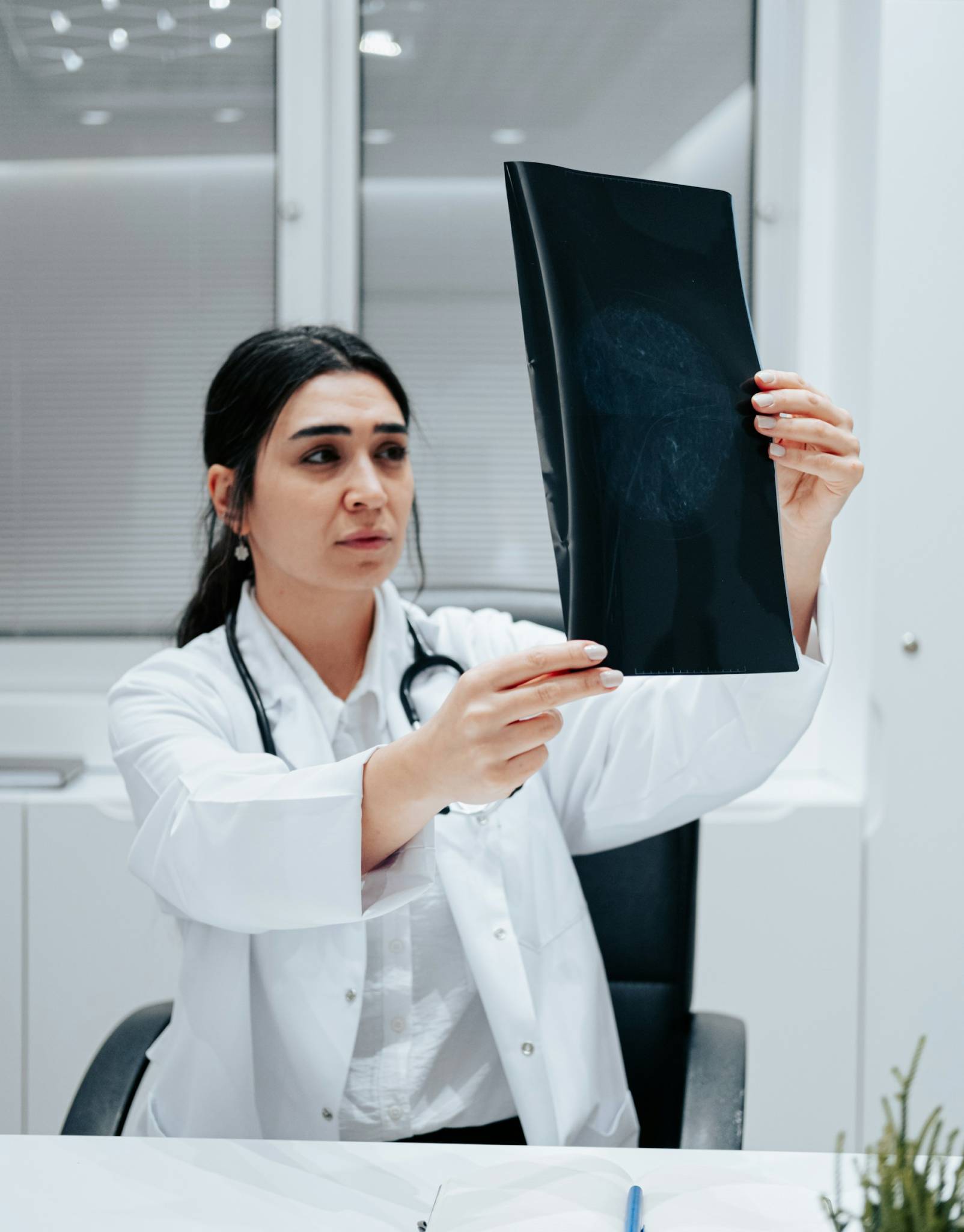 Doctor checking x-ray report